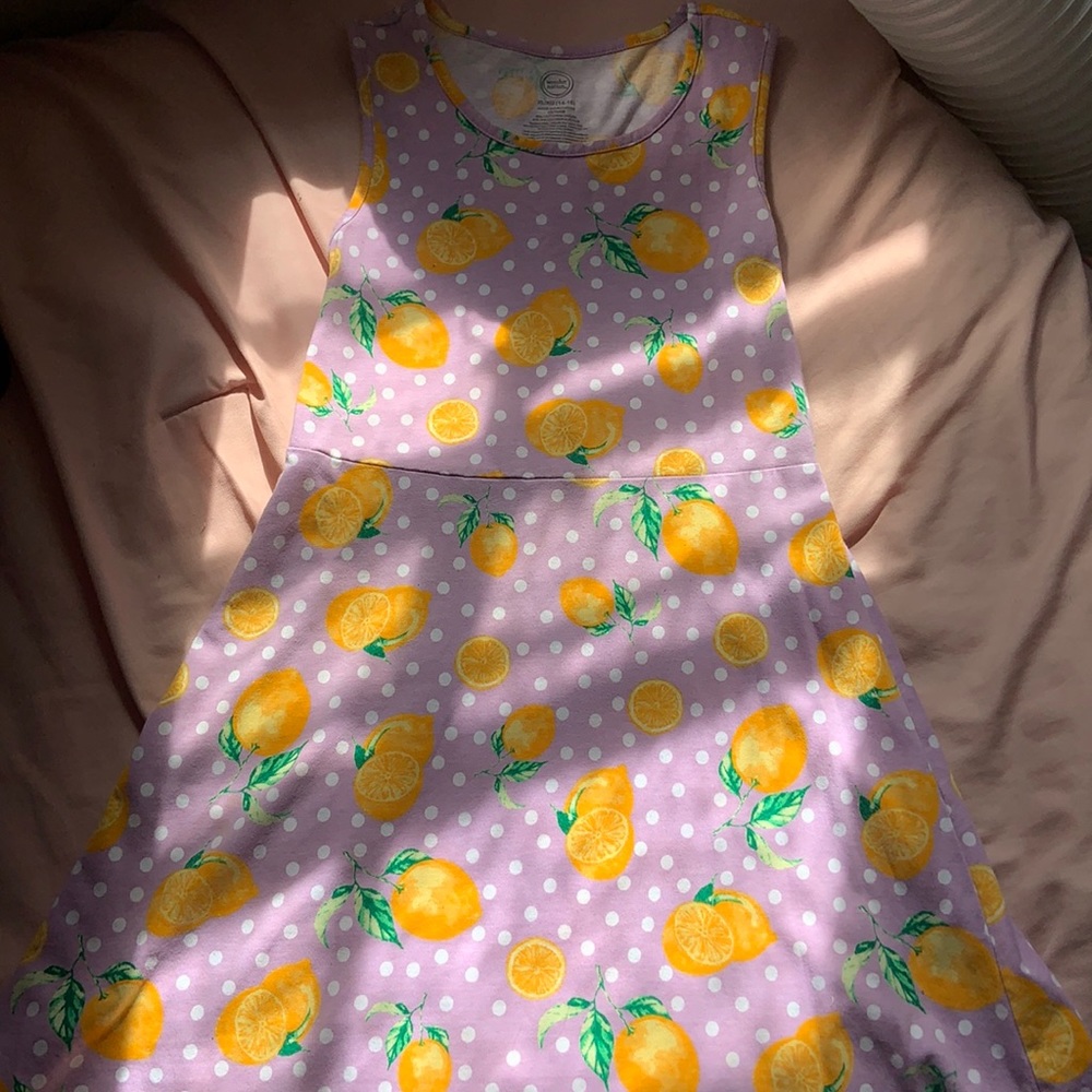 Cute lavender dress with lemons and polka dots.